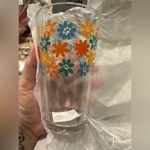 Paw print drinking glass with flowers